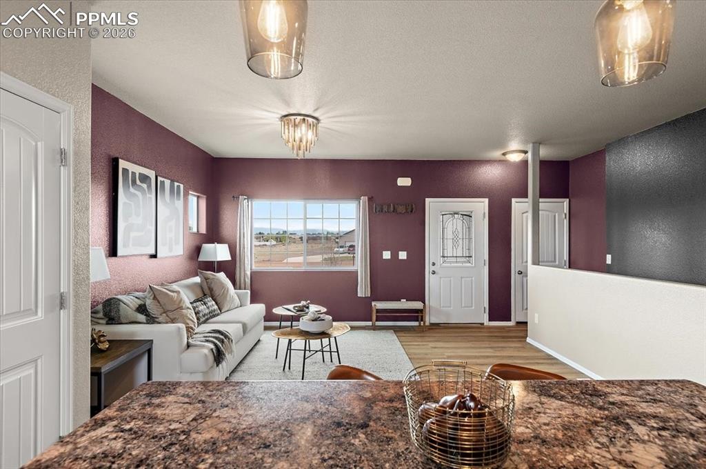 Image 14 of 41: Open floor plan, new LVP, new light fixtures, new paint