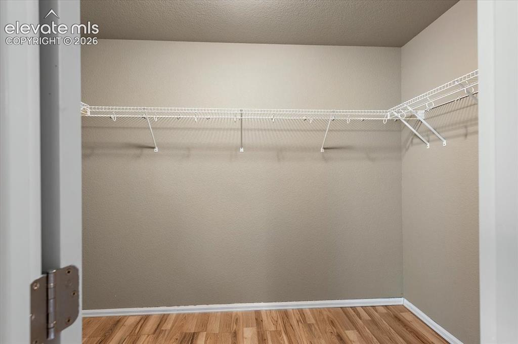 Image 28 of 40: Basement bedroom walk-in closet