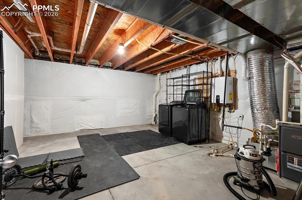 Image 30 of 41: Bonus unfinished mechanical space in basement with space for home gym or st