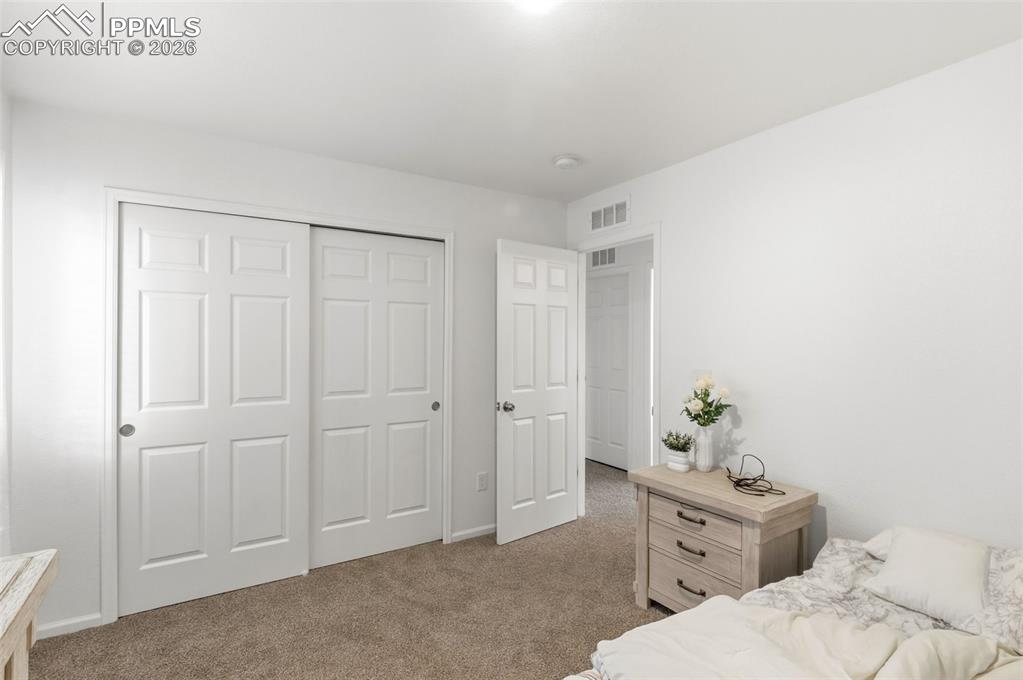 Image 22 of 36: Bedroom