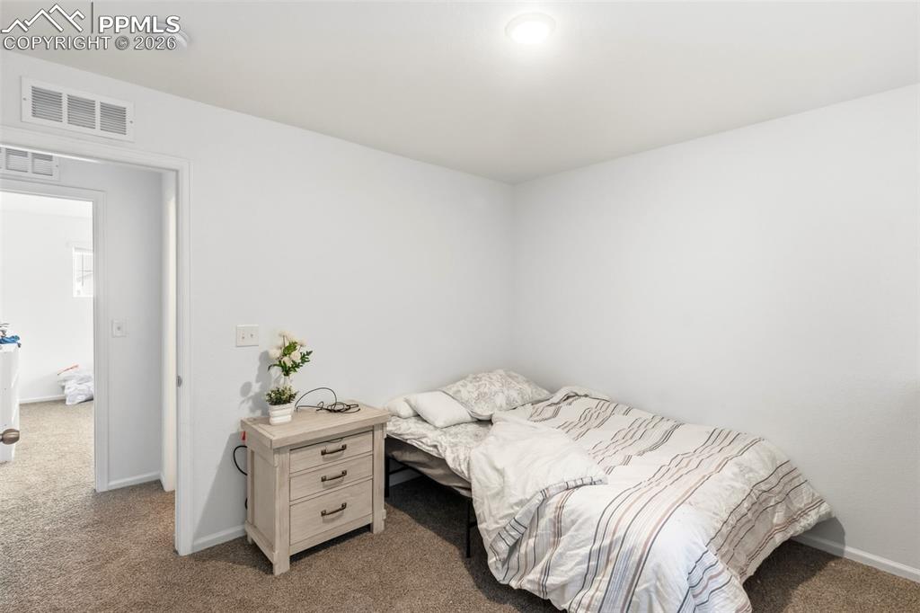 Image 23 of 36: Bedroom