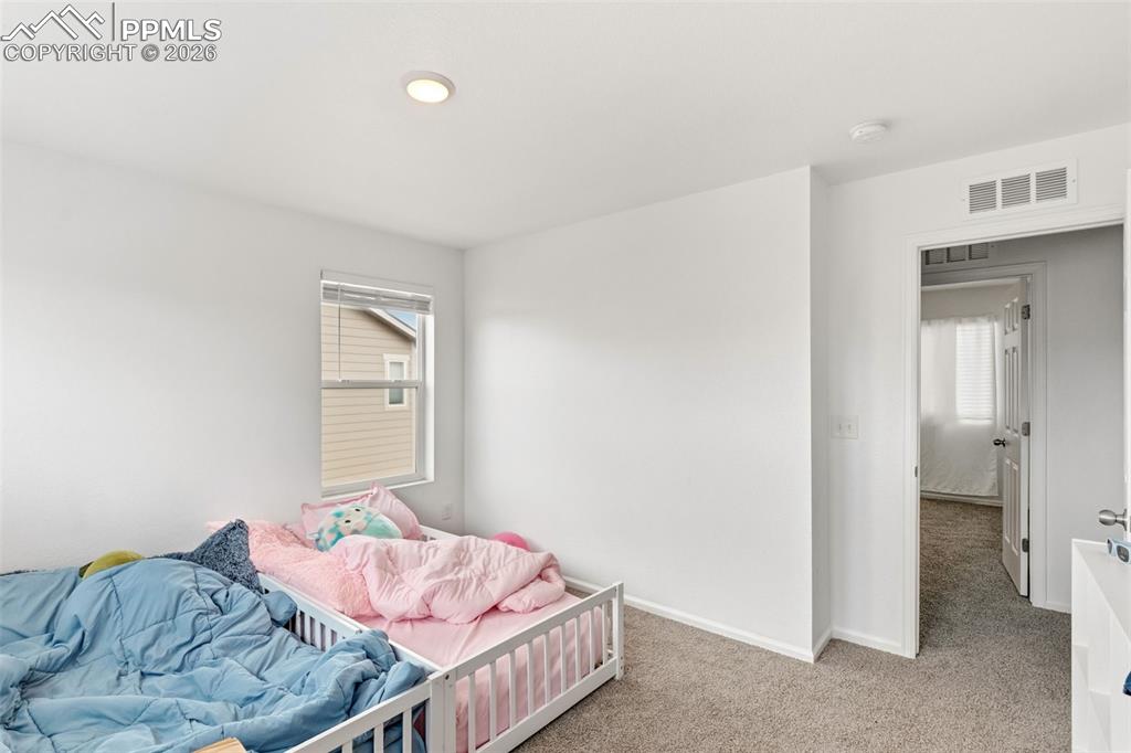 Image 26 of 36: Bedroom