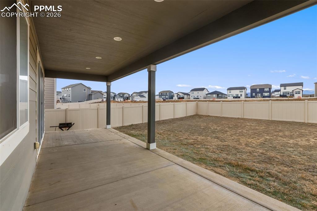 Image 32 of 36: Covered backyard patio!