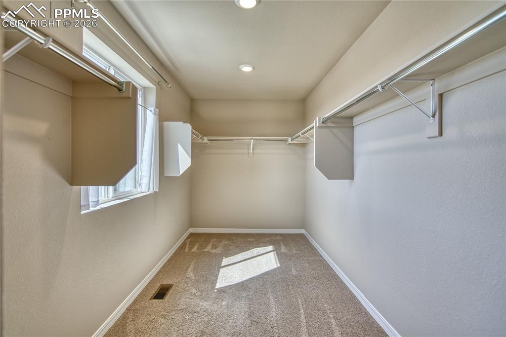 Image 18 of 46: Primary Bedroom Walk-in closet