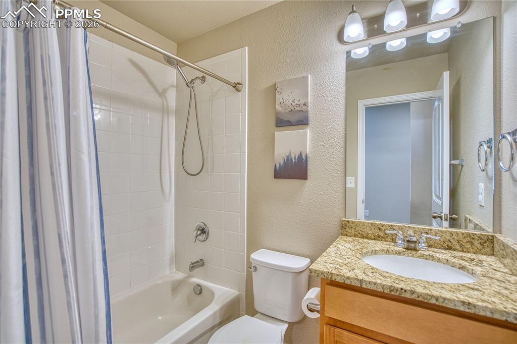 Image 24 of 46: Main level bathroom