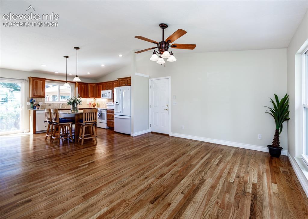 Image 5 of 34: Living Room & Kitchen