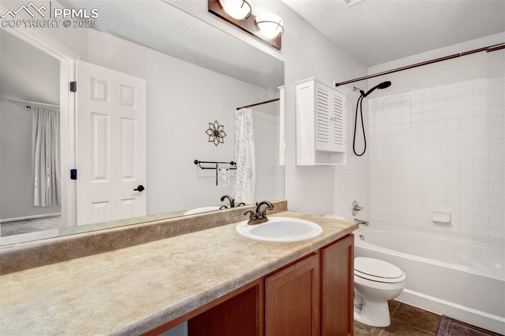 Image 8 of 24: Home owners full bathroom with garden tub, and a new shower head