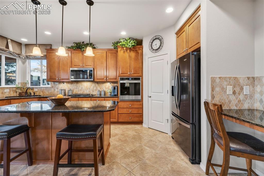 Image 15 of 50: Walk in pantry is perfectly located