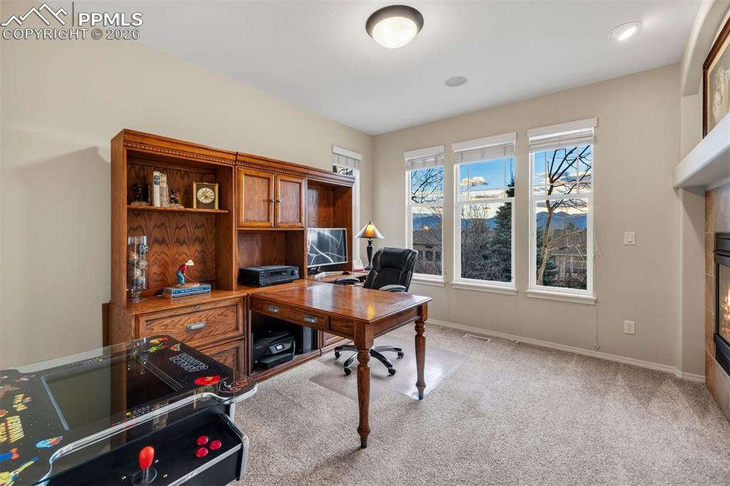 Image 17 of 50: the main level office offers that amazing view too. 