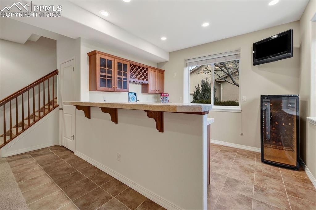 Image 32 of 50: Enjoy entertaining in the basememt 