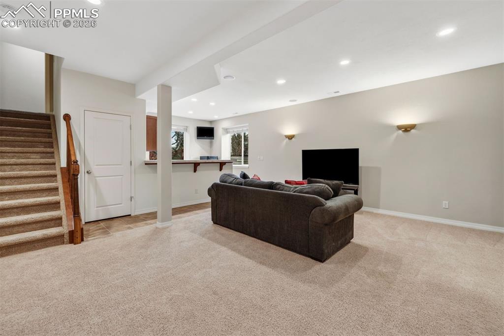 Image 34 of 50: Extended entertaining in the basement area