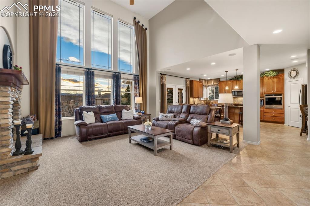 Image 8 of 50: Another look at the Family Room with soaring ceilings