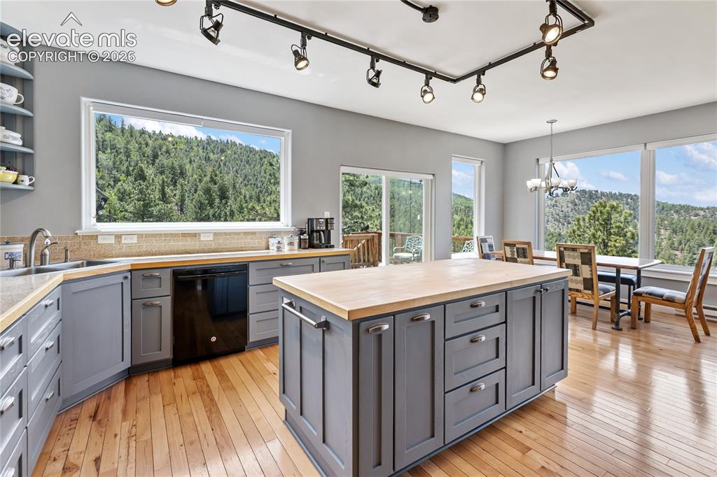 Image 11 of 31: Love this kitchen and the surround views