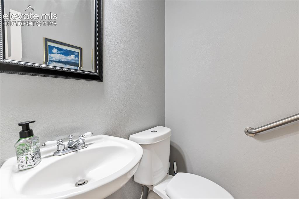 Image 12 of 31: 1/2 bath on main