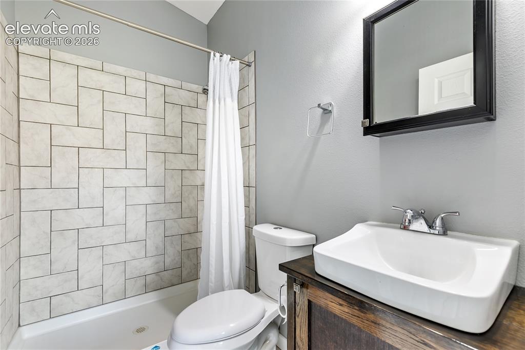 Image 15 of 31: Attached 3/4 bath to the second upper level bedroom