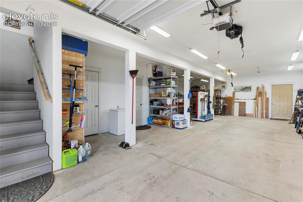Image 24 of 31: Big 2 car tandem garage with heat and room for workshop