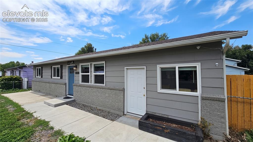 Image 1 of 31: Single-story residence featuring horizontal siding and brick siding