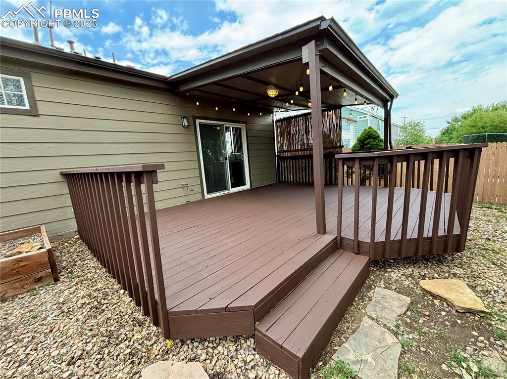 Image 26 of 44: View of wooden deck