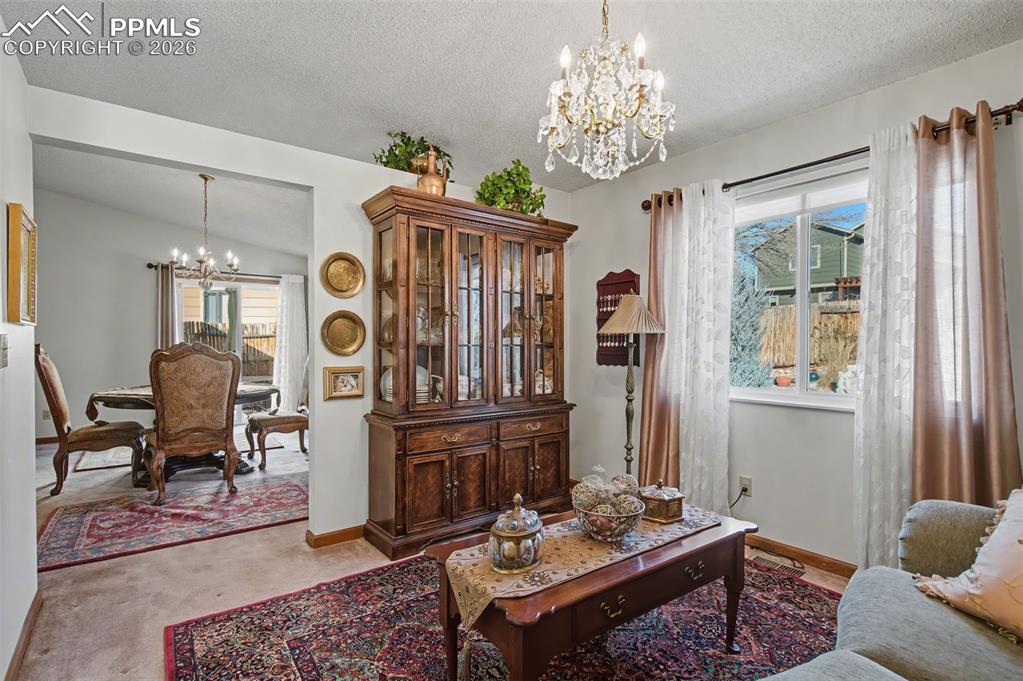 Image 15 of 48: Could be formal dining but used as a sitting room