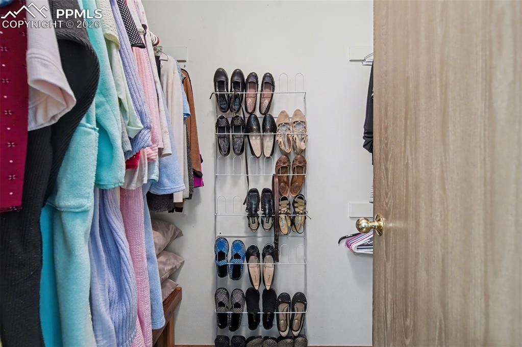 Image 20 of 48: walk in closet in primary bedroom