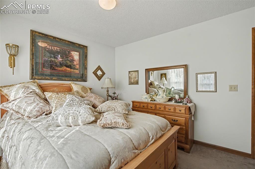 Image 23 of 48: main level bedroom