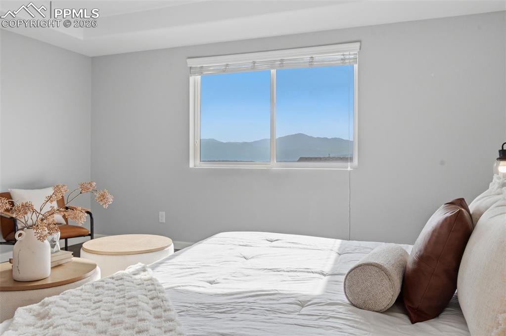 Image 20 of 49: Pikes Peak views from the primary bedroom