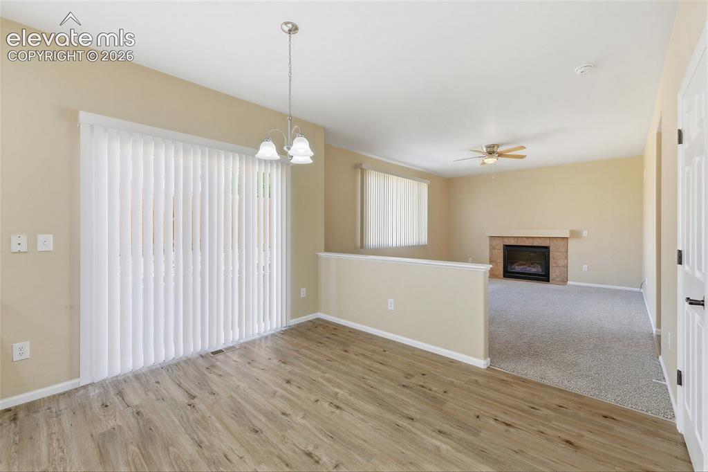 Image 14 of 39: Kitchen looking into family room