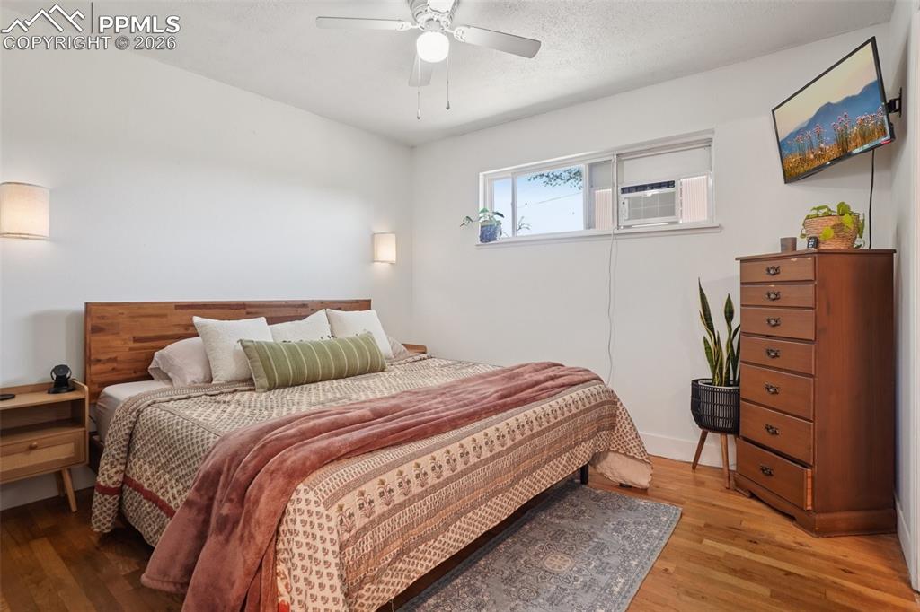 Image 11 of 38: Primary bedroom with en suite bathroom
