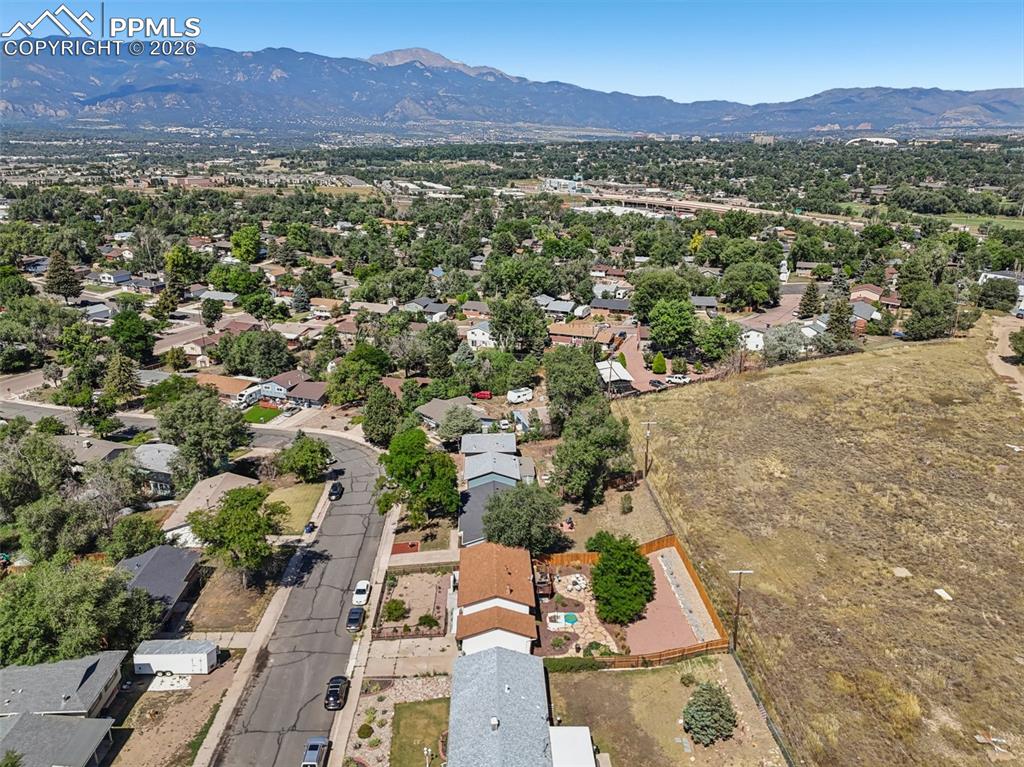 Image 36 of 38: Aerial view of the home, just look at Pikes Peak!