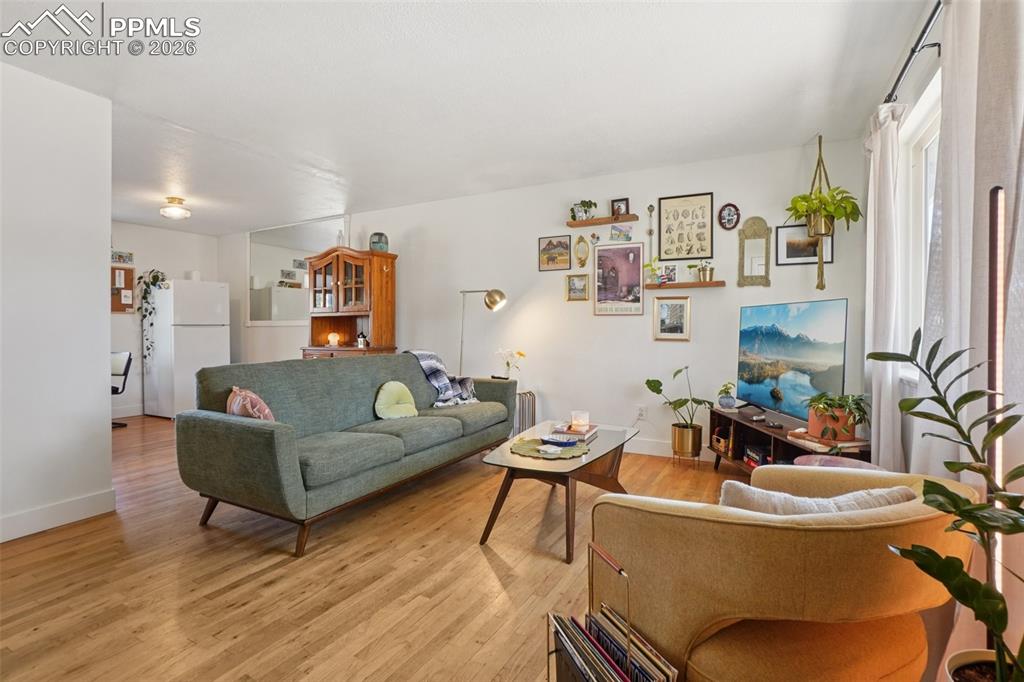 Image 7 of 38: Living room with plenty of natural light