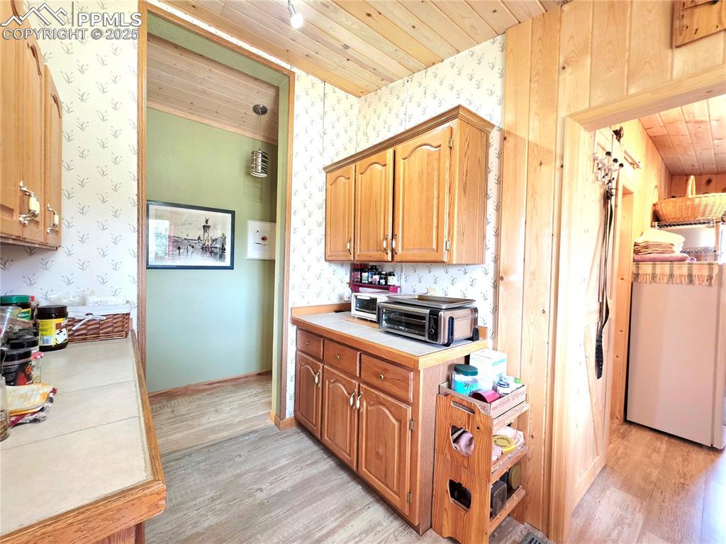 Image 18 of 50: More kitchen storage and counter space