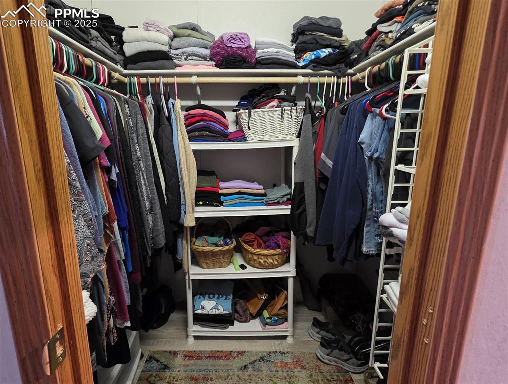 Image 29 of 50: Spacious walk in closet
