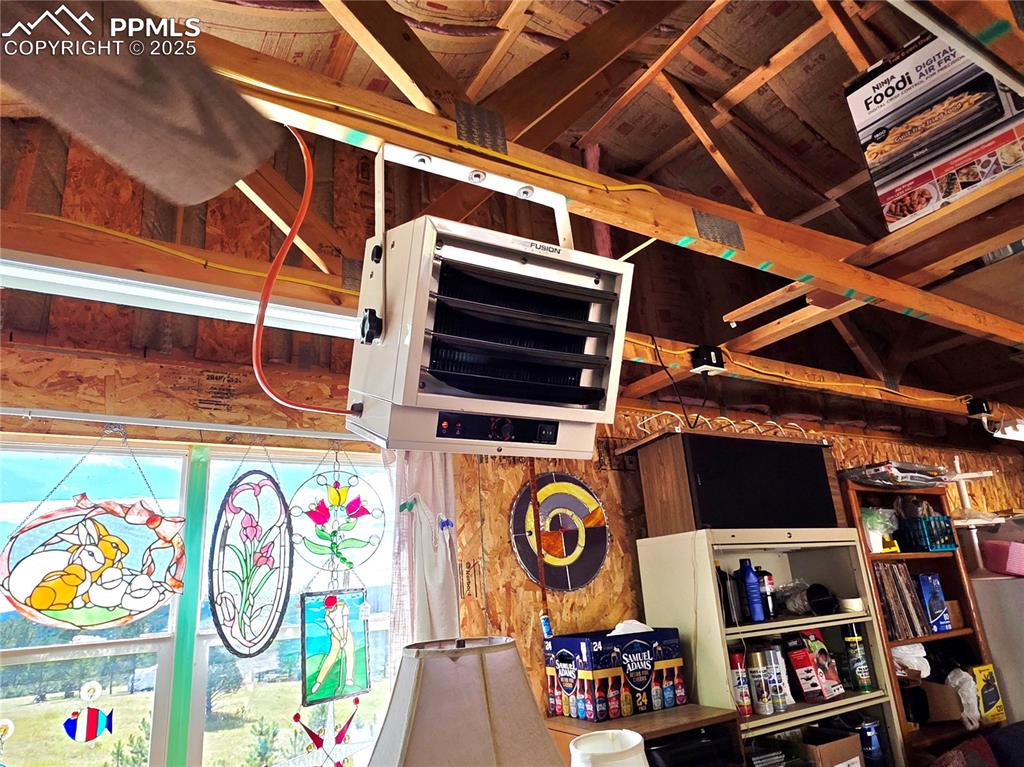 Image 44 of 50: Heater in the garage for year round use