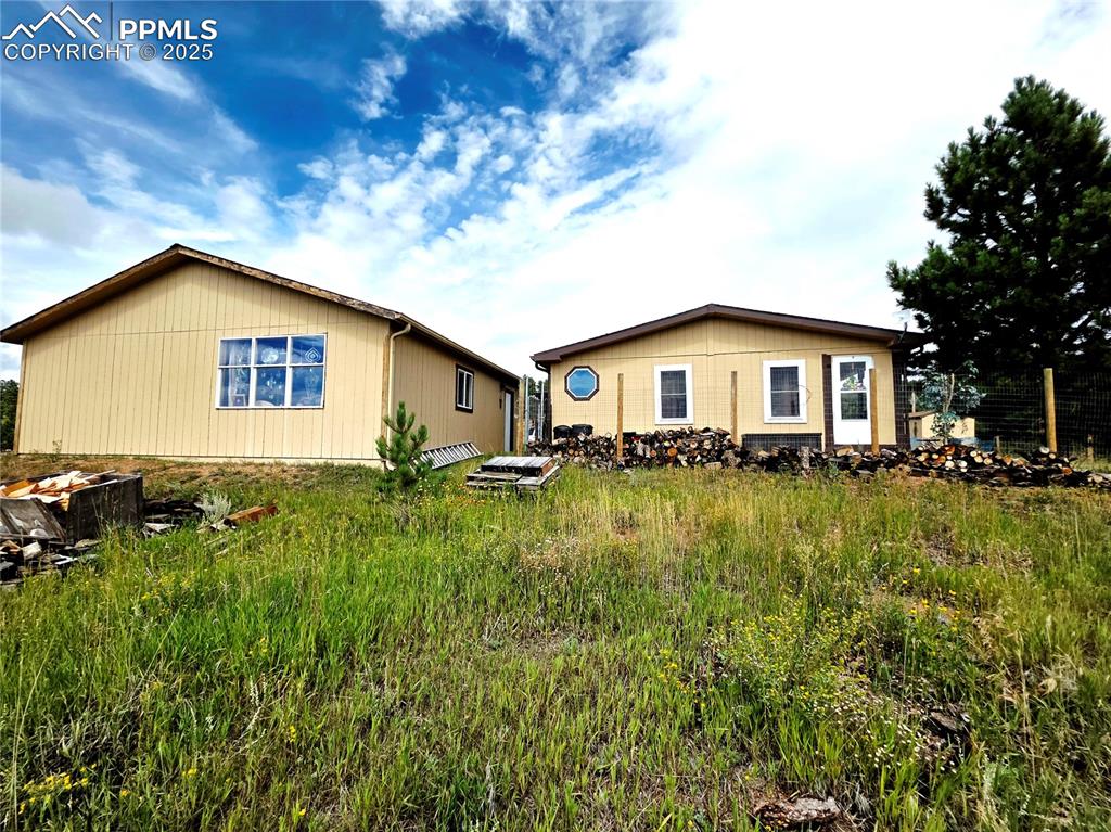 Image 5 of 50: Sellers had large picture window put into the garage where seller has a sta