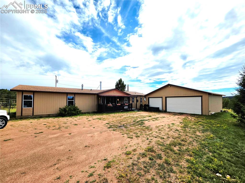 Image 6 of 50: Nice level driveway with 3 car garage. Enjoy ease of pulling up straight to