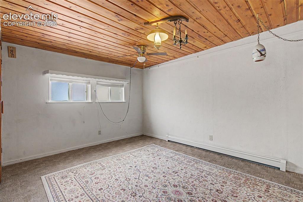 Image 18 of 26: View of bederoom from laundry room entry