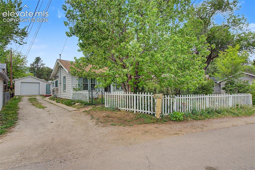 Image 2 of 26: View of entire property from cross street
