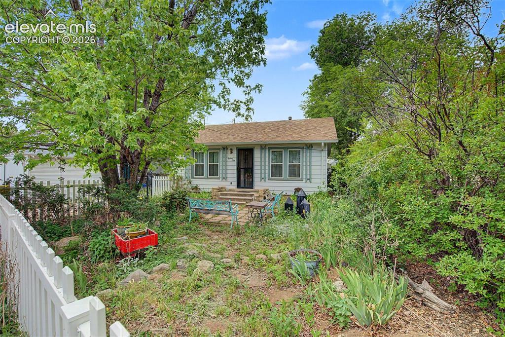 Image 4 of 26: View of front yard from street