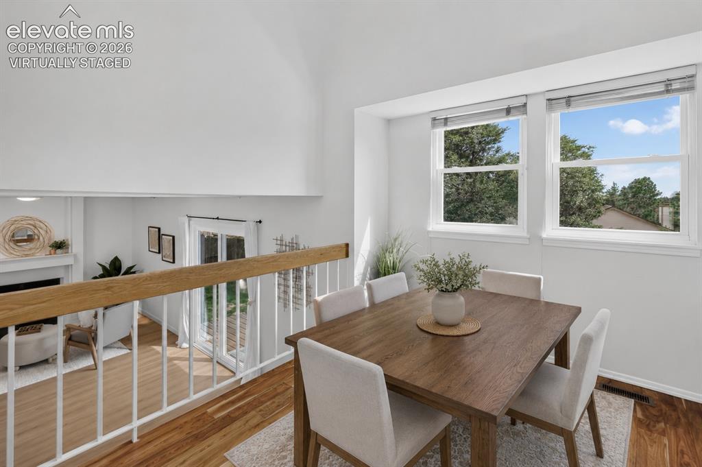 Image 11 of 25: Virtually staged dining area