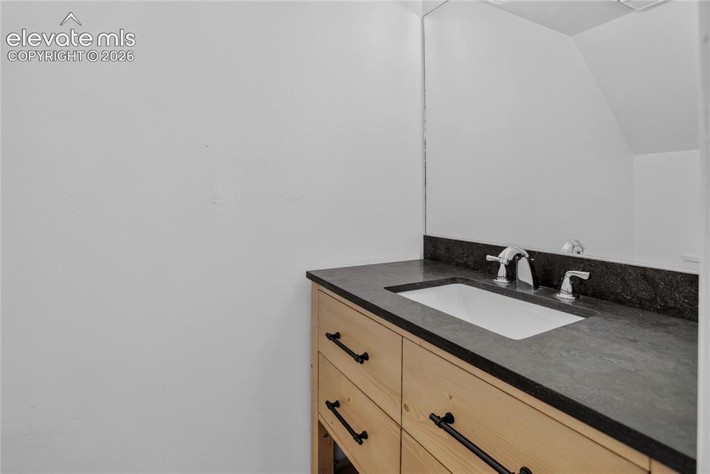 Image 19 of 25: Powder room - lower level