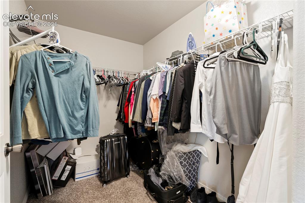 Image 16 of 48: Primary Walk In Closet Main Floor