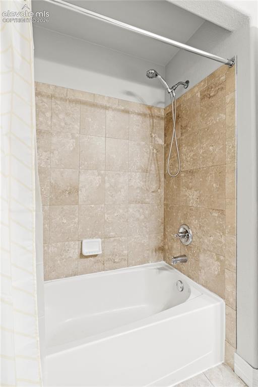 Image 24 of 48: Basement Shower