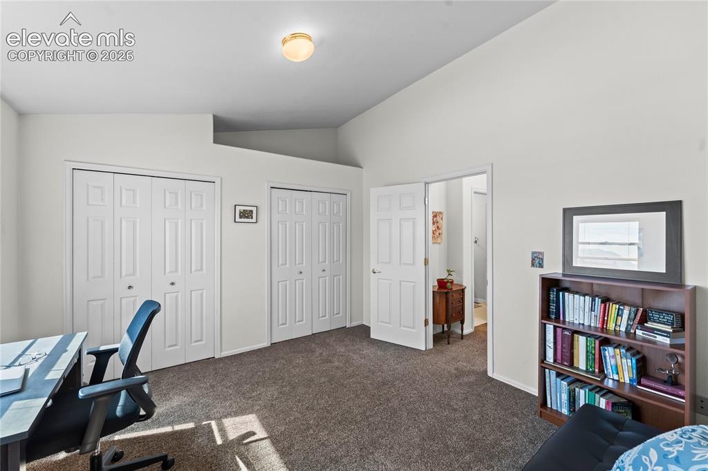 Image 18 of 43: Vaulted ceiling with flush-mount lighting