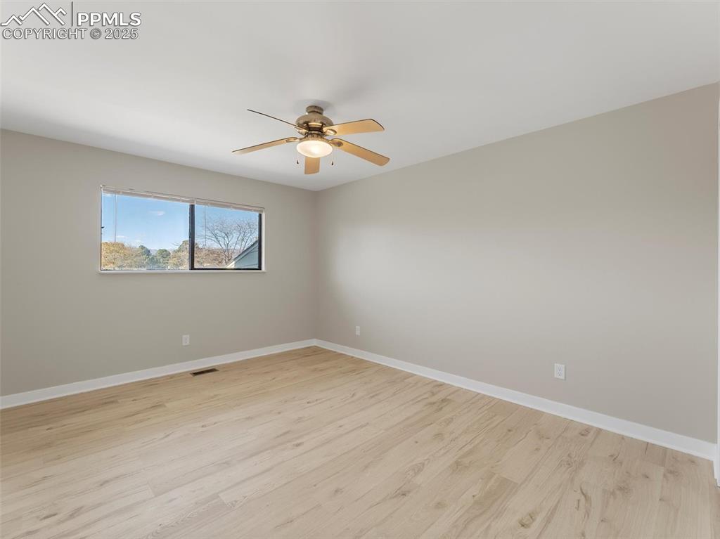 Image 16 of 36: Wood plank laminate flooring