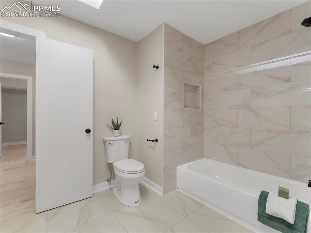 Image 22 of 36: Full bath with tub / shower combination 