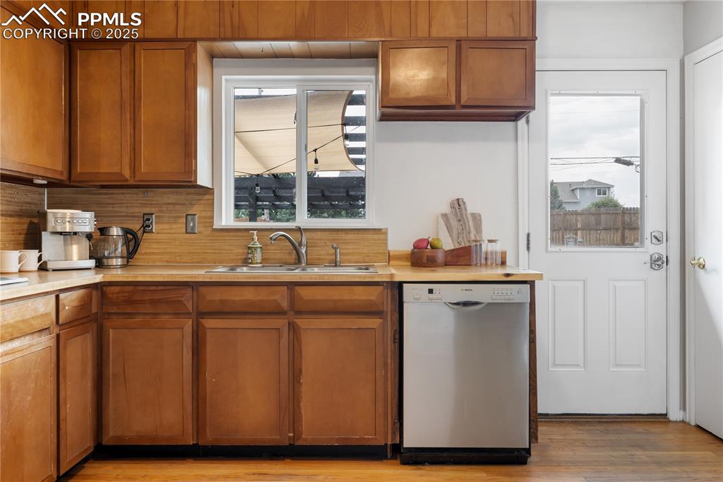 Image 12 of 35: Bright kitchen with backyard access