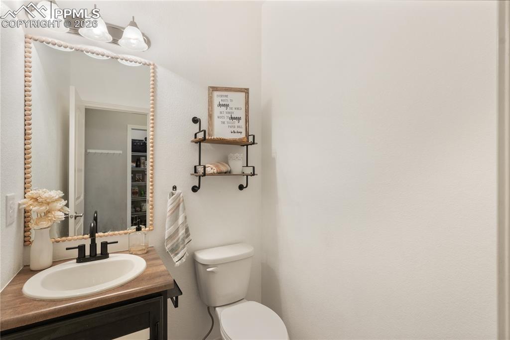 Image 23 of 50: Bathroom featuring vanity and toilet