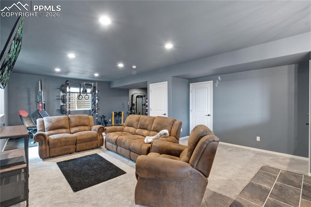 Image 46 of 50: 2nd Living area featuring recessed lighting and carpet