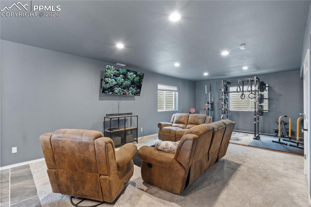 Image 47 of 50: 2nd Living room with recessed lighting and baseboards