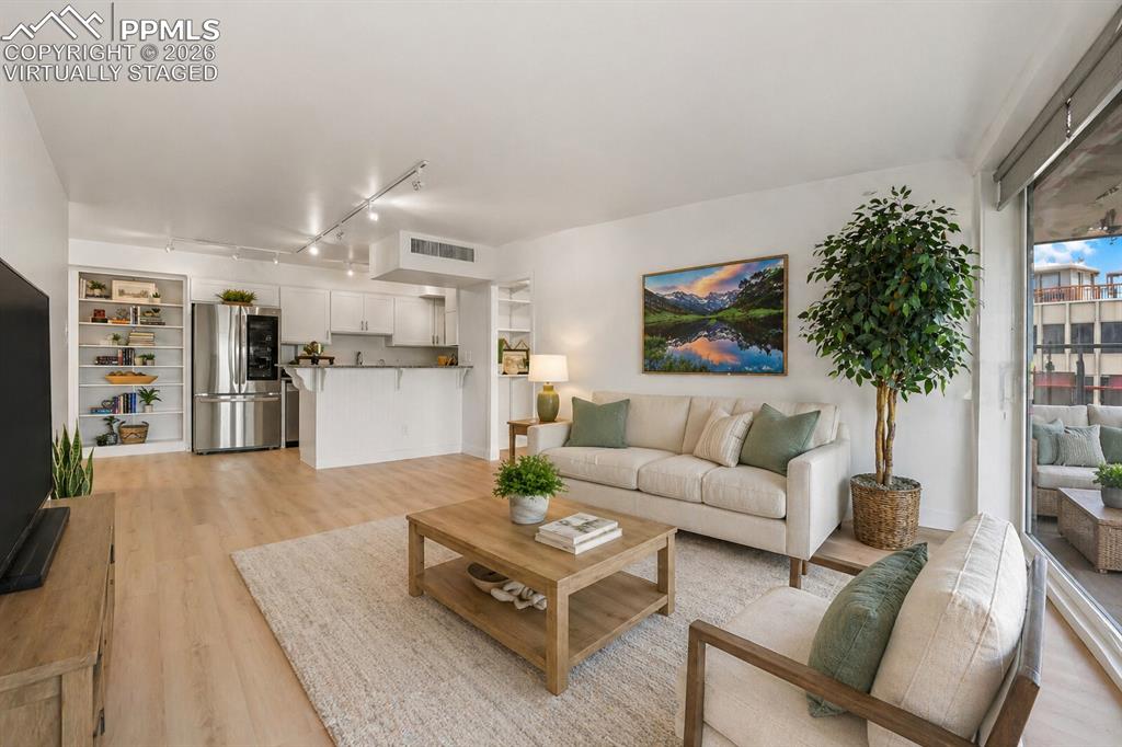 Image 11 of 30: virtually staged living room 